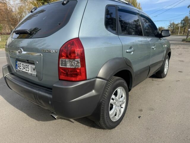 Синий Хендай Туксон, объемом двигателя 2 л и пробегом 198 тыс. км за 7999 $, фото 2 на Automoto.ua