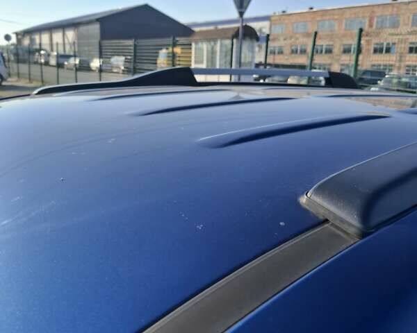 Синій Хендай Туксон, об'ємом двигуна 2 л та пробігом 158 тис. км за 8500 $, фото 20 на Automoto.ua