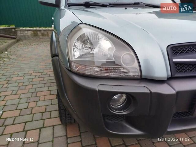 Синий Хендай Туксон, объемом двигателя 2 л и пробегом 213 тыс. км за 8900 $, фото 38 на Automoto.ua