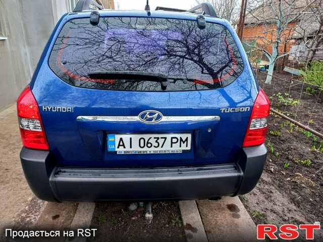 Синій Хендай Туксон, об'ємом двигуна 2 л та пробігом 153 тис. км за 8200 $, фото 2 на Automoto.ua
