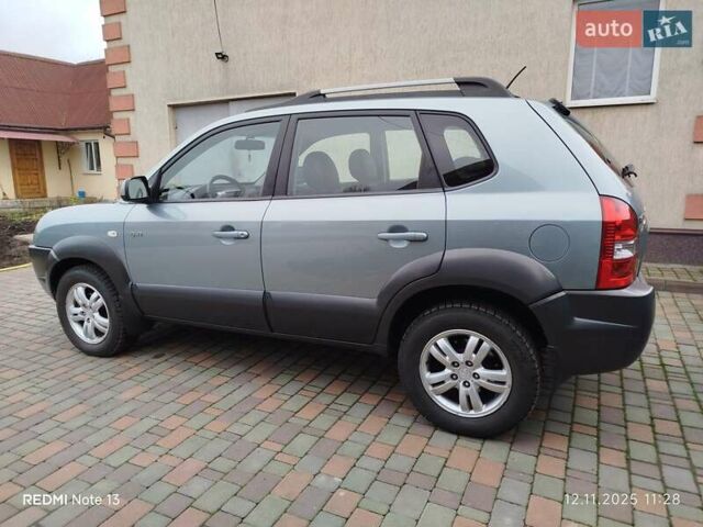 Синий Хендай Туксон, объемом двигателя 2 л и пробегом 213 тыс. км за 8900 $, фото 99 на Automoto.ua