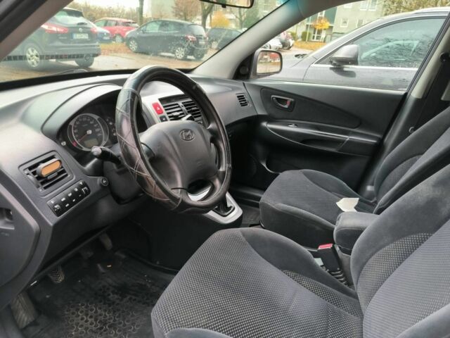 Синий Хендай Туксон, объемом двигателя 2 л и пробегом 156 тыс. км за 6850 $, фото 3 на Automoto.ua