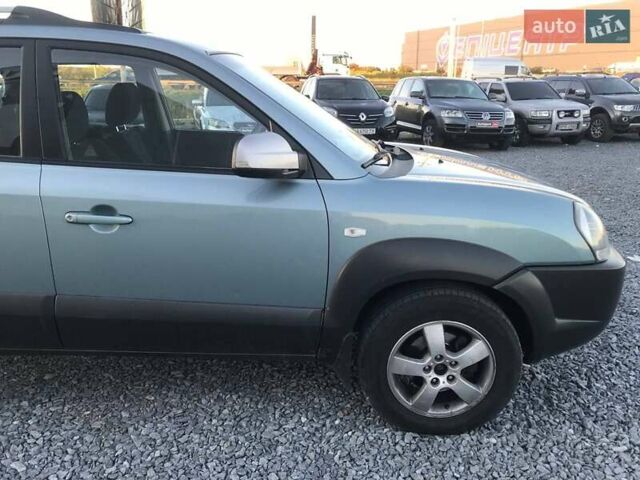 Синий Хендай Туксон, объемом двигателя 2 л и пробегом 207 тыс. км за 7990 $, фото 15 на Automoto.ua