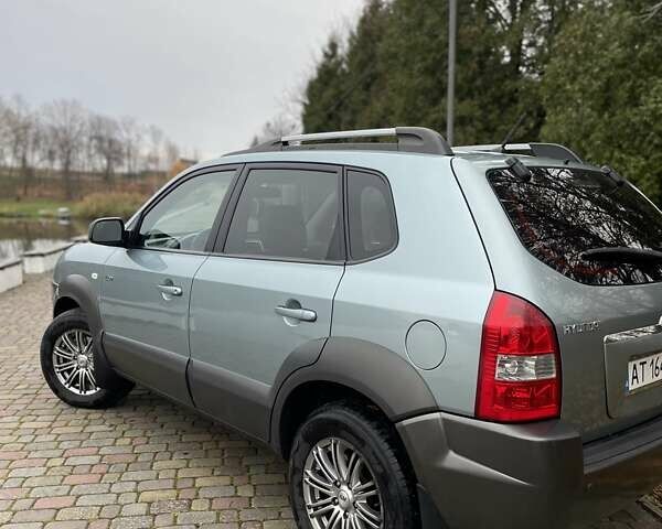Синий Хендай Туксон, объемом двигателя 1.98 л и пробегом 168 тыс. км за 8500 $, фото 14 на Automoto.ua