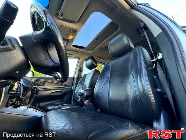 Хендай Туксон 2008 у Кременчуге на Automoto.ua Синій Хендай Туксон, об'ємом двигуна 2 л та пробігом 233 тис. км за 8300 $, фото 3 на Automoto.ua