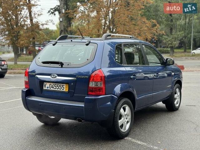 Синий Хендай Туксон, объемом двигателя 1.98 л и пробегом 178 тыс. км за 8999 $, фото 13 на Automoto.ua