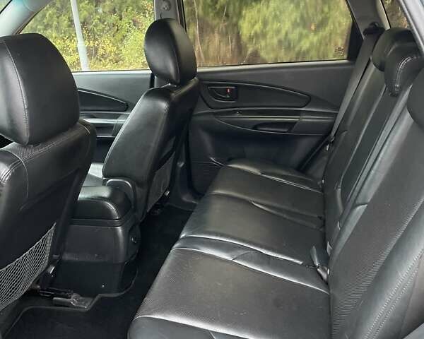 Синий Хендай Туксон, объемом двигателя 1.98 л и пробегом 168 тыс. км за 8500 $, фото 10 на Automoto.ua