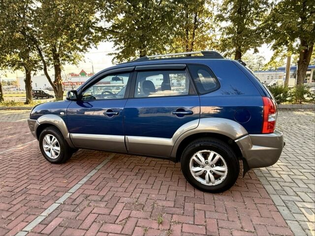 Синий Хендай Туксон, объемом двигателя 2 л и пробегом 168 тыс. км за 7500 $, фото 3 на Automoto.ua