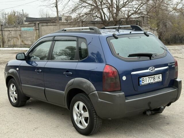 Синий Хендай Туксон, объемом двигателя 2 л и пробегом 279 тыс. км за 6280 $, фото 7 на Automoto.ua