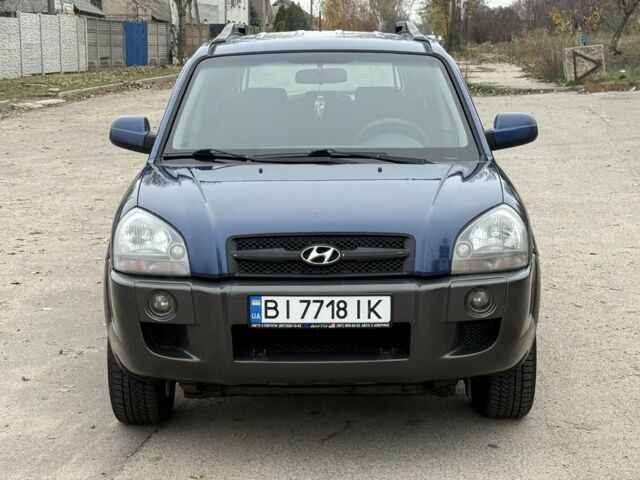 Синий Хендай Туксон, объемом двигателя 2 л и пробегом 279 тыс. км за 6280 $, фото 4 на Automoto.ua