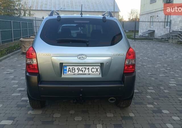Синий Хендай Туксон, объемом двигателя 1.98 л и пробегом 183 тыс. км за 6700 $, фото 3 на Automoto.ua