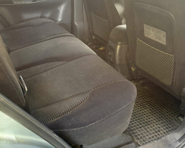 Синий Хендай Туксон, объемом двигателя 1.98 л и пробегом 200 тыс. км за 7700 $, фото 20 на Automoto.ua