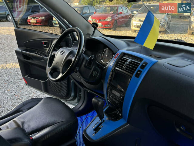 Синий Хендай Туксон, объемом двигателя 2 л и пробегом 317 тыс. км за 9600 $, фото 19 на Automoto.ua