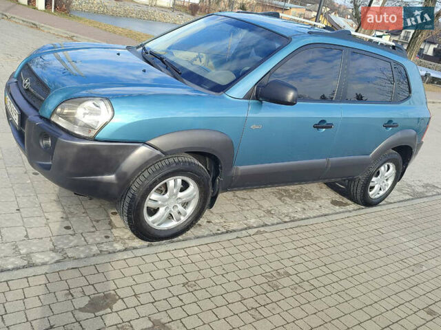 Синій Хендай Туксон, об'ємом двигуна 2 л та пробігом 147 тис. км за 9300 $, фото 15 на Automoto.ua