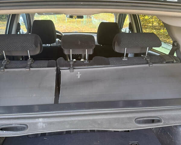 Синий Хендай Туксон, объемом двигателя 1.98 л и пробегом 200 тыс. км за 7700 $, фото 25 на Automoto.ua