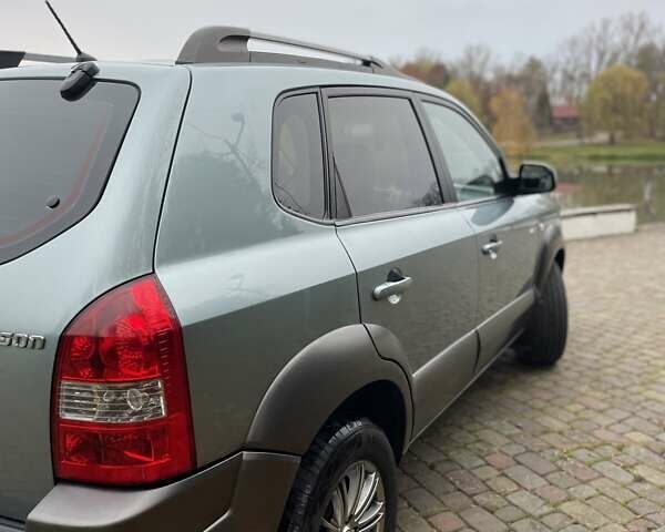 Синий Хендай Туксон, объемом двигателя 1.98 л и пробегом 168 тыс. км за 8500 $, фото 13 на Automoto.ua