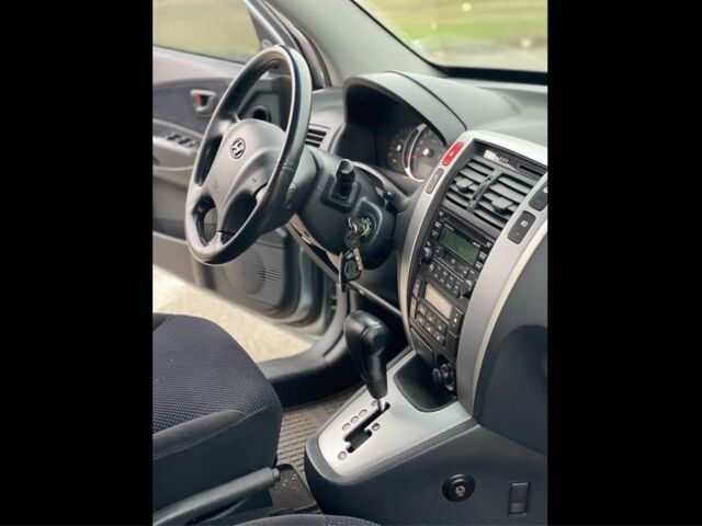 Синий Хендай Туксон, объемом двигателя 2 л и пробегом 179 тыс. км за 6500 $, фото 13 на Automoto.ua