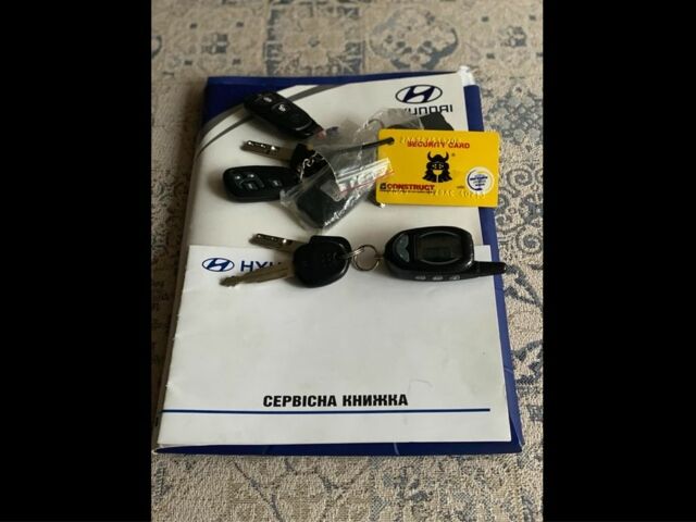 Синий Хендай Туксон, объемом двигателя 2 л и пробегом 179 тыс. км за 6500 $, фото 19 на Automoto.ua