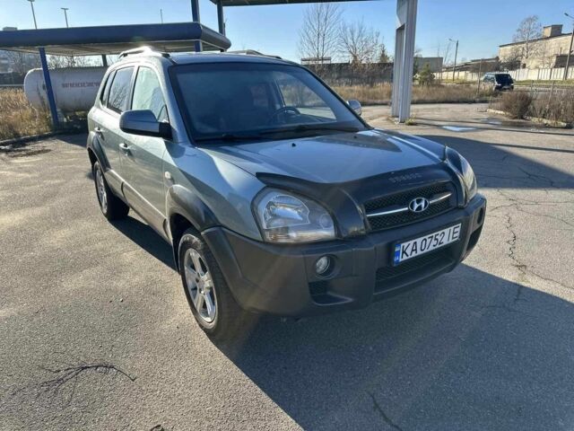 Синий Хендай Туксон, объемом двигателя 2 л и пробегом 187 тыс. км за 8200 $, фото 1 на Automoto.ua
