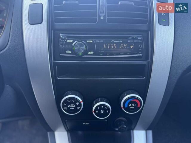 Синий Хендай Туксон, объемом двигателя 1.98 л и пробегом 178 тыс. км за 8700 $, фото 24 на Automoto.ua