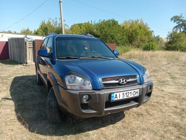 Синий Хендай Туксон, объемом двигателя 2 л и пробегом 240 тыс. км за 7700 $, фото 1 на Automoto.ua
