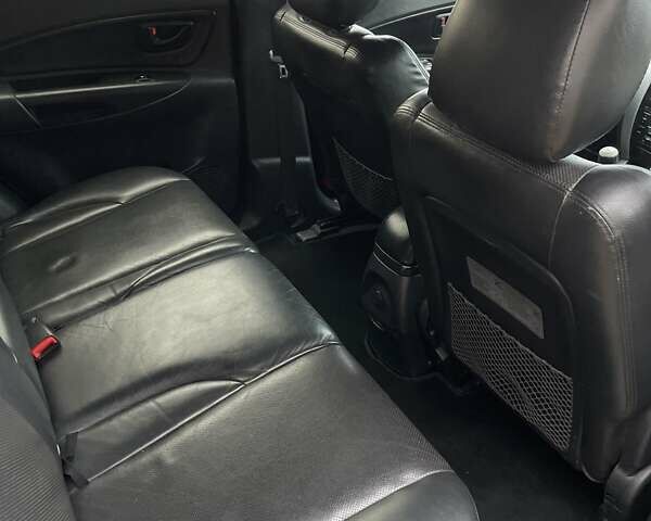 Синий Хендай Туксон, объемом двигателя 1.98 л и пробегом 168 тыс. км за 8500 $, фото 8 на Automoto.ua