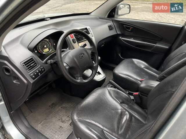 Синий Хендай Туксон, объемом двигателя 2.7 л и пробегом 220 тыс. км за 7900 $, фото 8 на Automoto.ua