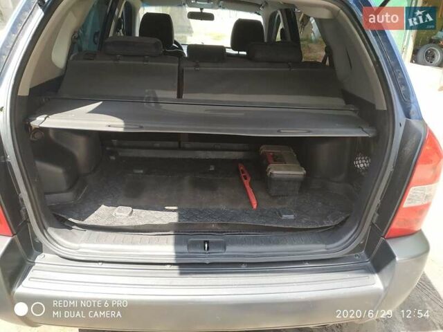Синий Хендай Туксон, объемом двигателя 2 л и пробегом 200 тыс. км за 7600 $, фото 12 на Automoto.ua