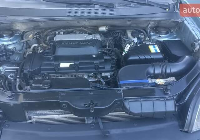 Синий Хендай Туксон, объемом двигателя 1.98 л и пробегом 183 тыс. км за 6700 $, фото 17 на Automoto.ua