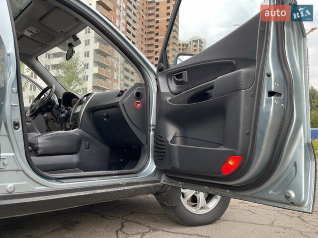 Синий Хендай Туксон, объемом двигателя 2.7 л и пробегом 220 тыс. км за 7900 $, фото 12 на Automoto.ua