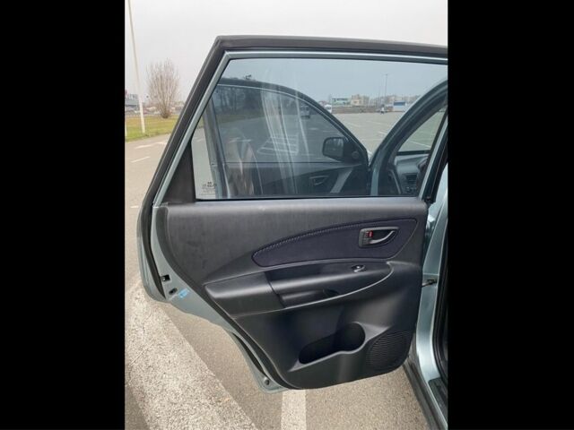 Синий Хендай Туксон, объемом двигателя 2 л и пробегом 179 тыс. км за 6500 $, фото 9 на Automoto.ua