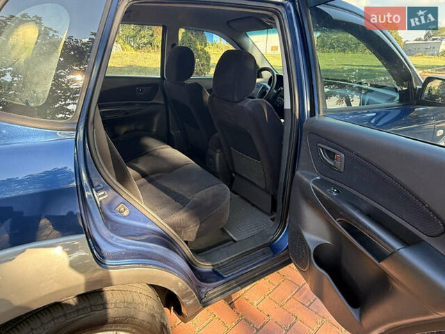 Синий Хендай Туксон, объемом двигателя 2 л и пробегом 168 тыс. км за 6900 $, фото 12 на Automoto.ua