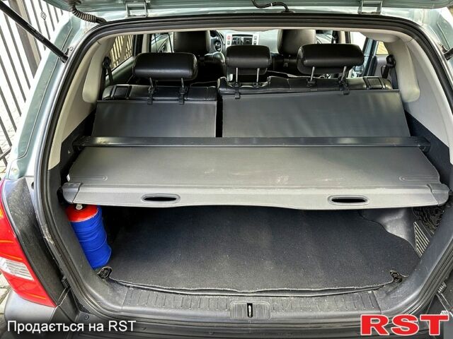 Хендай Туксон 2008 у Кременчуге на Automoto.ua Синій Хендай Туксон, об'ємом двигуна 2 л та пробігом 233 тис. км за 8300 $, фото 11 на Automoto.ua