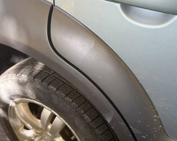 Синий Хендай Туксон, объемом двигателя 1.98 л и пробегом 200 тыс. км за 7700 $, фото 24 на Automoto.ua