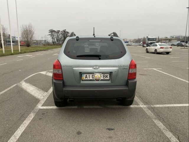 Синий Хендай Туксон, объемом двигателя 2 л и пробегом 179 тыс. км за 6500 $, фото 1 на Automoto.ua