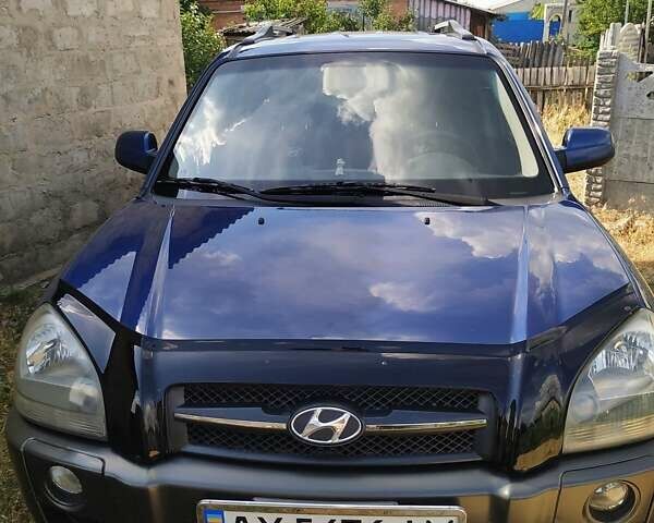 Синий Хендай Туксон, объемом двигателя 2 л и пробегом 200 тыс. км за 7600 $, фото 10 на Automoto.ua