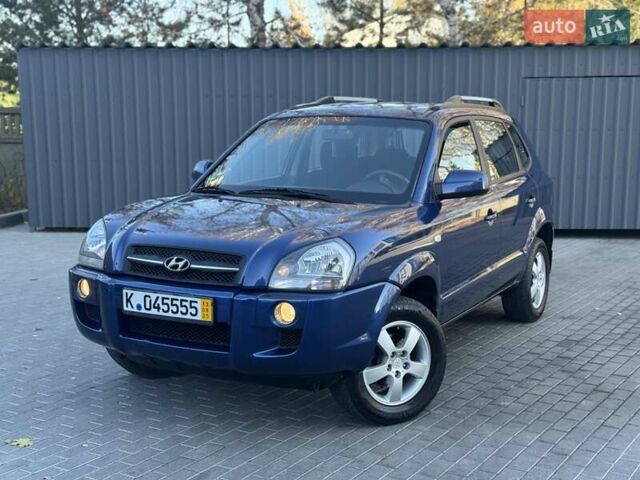 Синий Хендай Туксон, объемом двигателя 1.98 л и пробегом 178 тыс. км за 8700 $, фото 3 на Automoto.ua