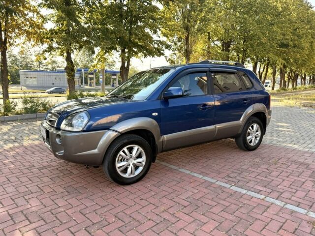 Синий Хендай Туксон, объемом двигателя 2 л и пробегом 168 тыс. км за 7500 $, фото 6 на Automoto.ua