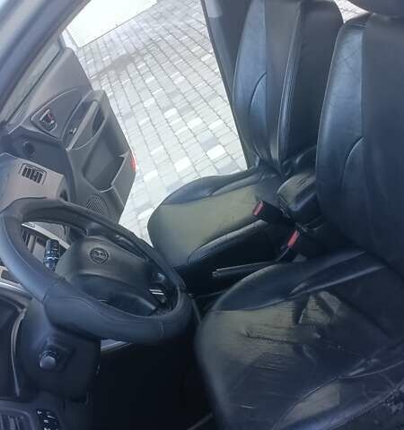 Синий Хендай Туксон, объемом двигателя 1.98 л и пробегом 183 тыс. км за 6700 $, фото 11 на Automoto.ua