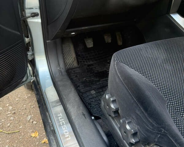 Синий Хендай Туксон, объемом двигателя 1.98 л и пробегом 200 тыс. км за 7700 $, фото 16 на Automoto.ua