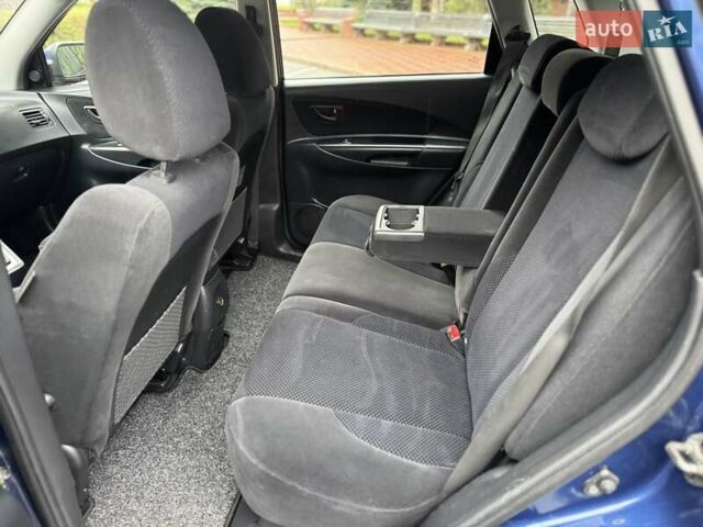 Синий Хендай Туксон, объемом двигателя 1.98 л и пробегом 178 тыс. км за 8999 $, фото 31 на Automoto.ua