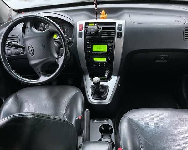 Синий Хендай Туксон, объемом двигателя 1.98 л и пробегом 168 тыс. км за 8500 $, фото 7 на Automoto.ua
