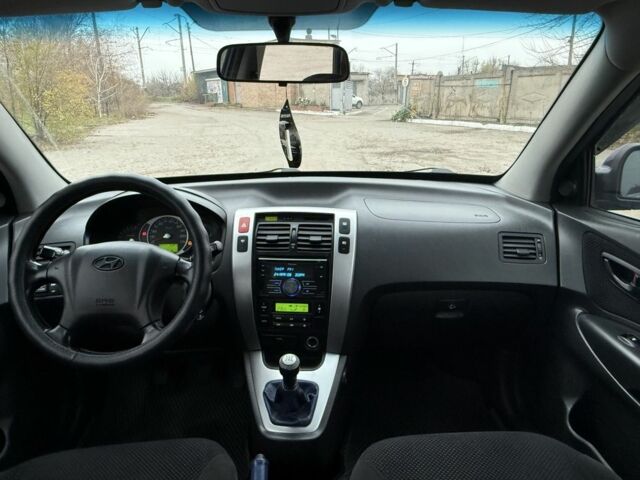 Синий Хендай Туксон, объемом двигателя 2 л и пробегом 279 тыс. км за 6280 $, фото 18 на Automoto.ua