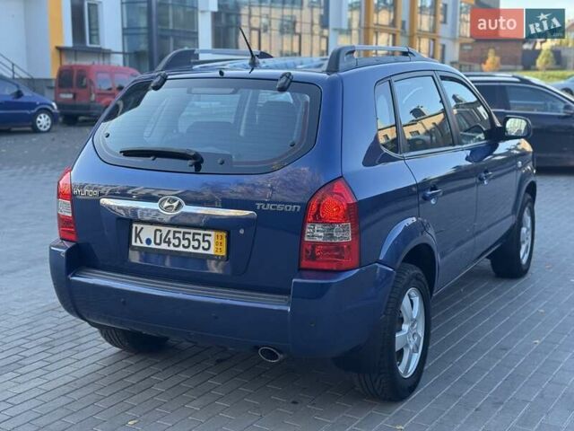 Синий Хендай Туксон, объемом двигателя 1.98 л и пробегом 178 тыс. км за 8700 $, фото 10 на Automoto.ua