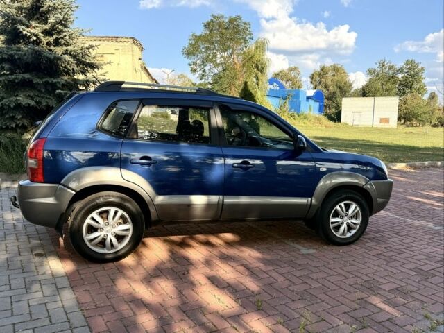 Синий Хендай Туксон, объемом двигателя 2 л и пробегом 168 тыс. км за 7500 $, фото 2 на Automoto.ua