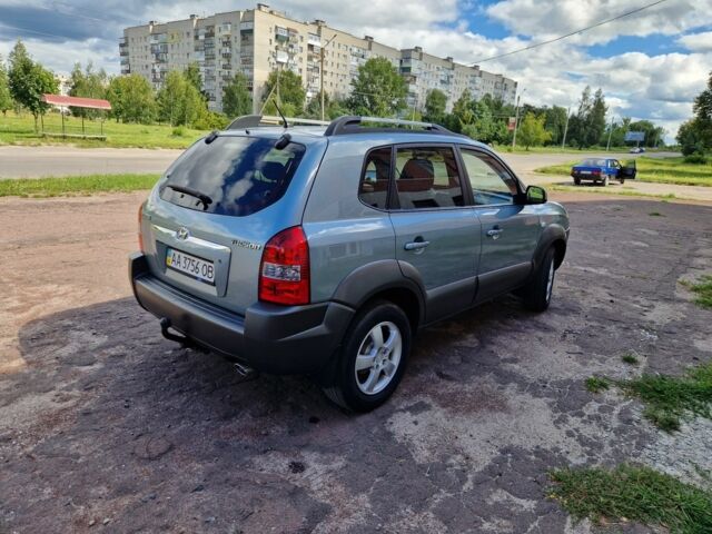 Синий Хендай Туксон, объемом двигателя 2 л и пробегом 137 тыс. км за 8500 $, фото 1 на Automoto.ua