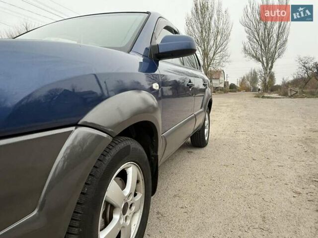 Синий Хендай Туксон, объемом двигателя 2 л и пробегом 270 тыс. км за 6250 $, фото 24 на Automoto.ua