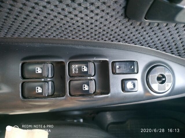 Синий Хендай Туксон, объемом двигателя 2 л и пробегом 200 тыс. км за 7600 $, фото 4 на Automoto.ua