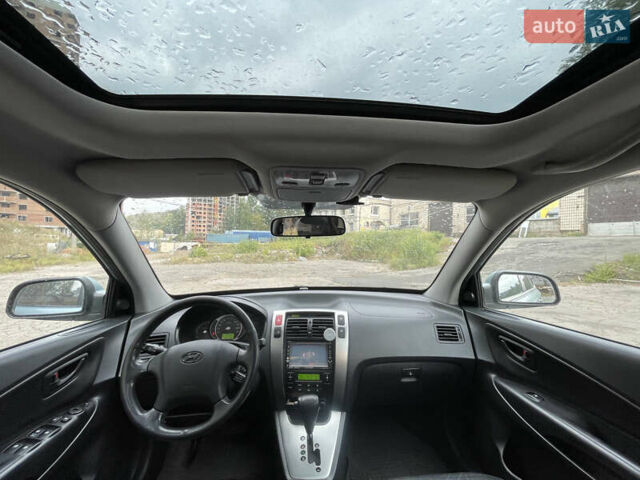 Синий Хендай Туксон, объемом двигателя 2.7 л и пробегом 220 тыс. км за 7900 $, фото 16 на Automoto.ua
