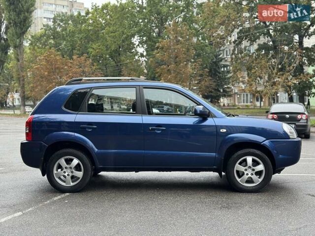 Синий Хендай Туксон, объемом двигателя 1.98 л и пробегом 178 тыс. км за 8999 $, фото 9 на Automoto.ua